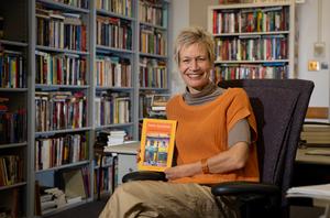 Christina Schwenkel with her book