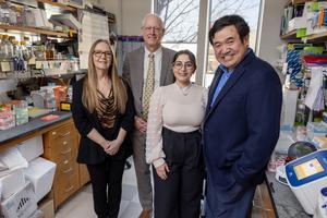 Study co-authors from Duke University stand in the lab together.