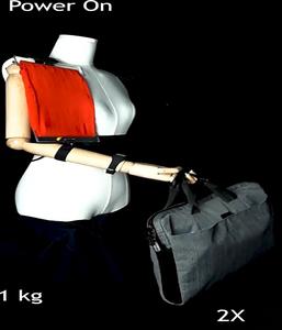 X-Crossing SMAs on the limb of a mannequin allow it to lift a 1kg bag.