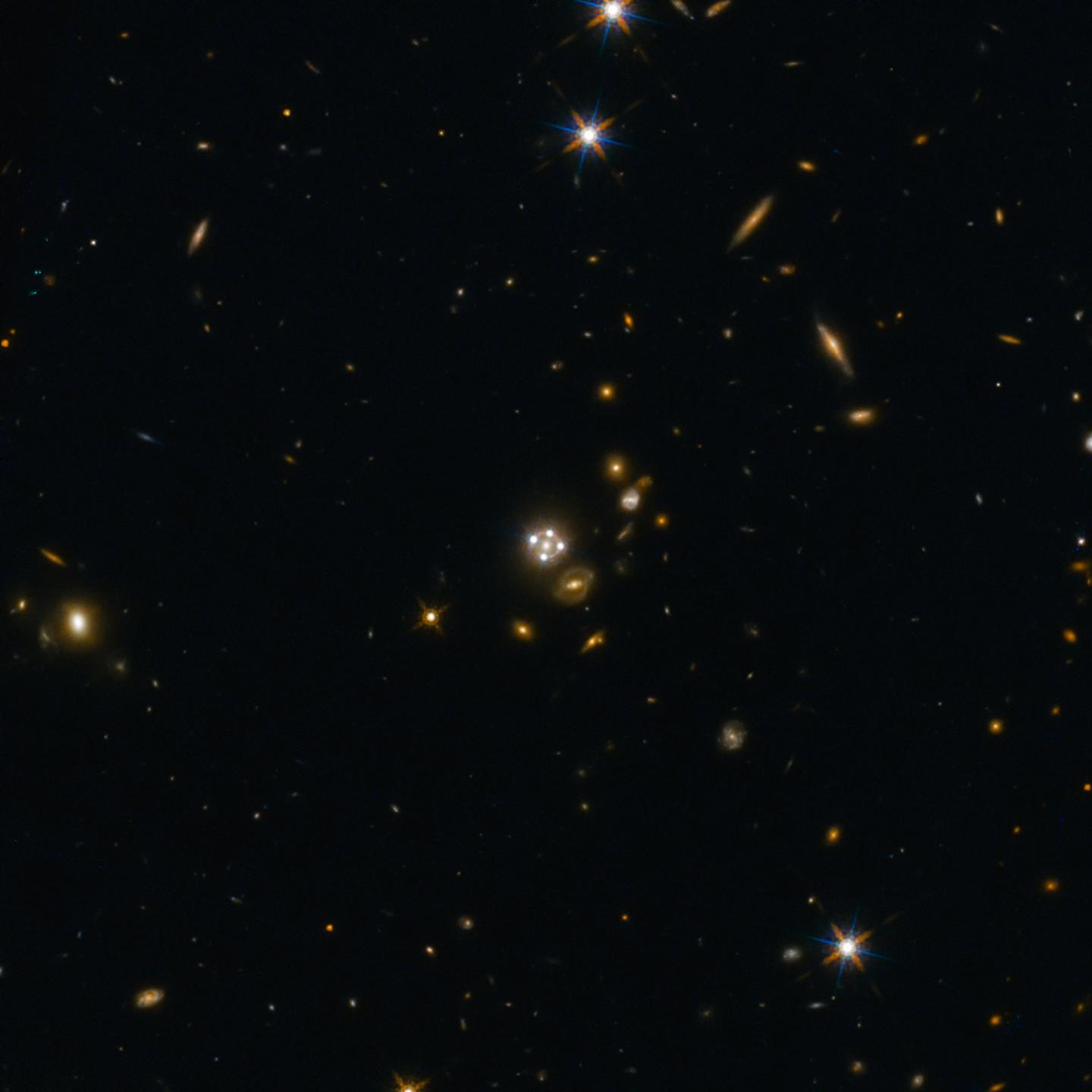 Astronomers Get Hints Of New Physics From Lensed Quasars