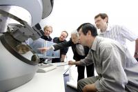 Scientists and Microscope