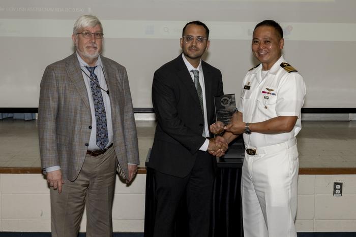 David Raudales (center), Ph.D., mechanical engineer at U.S. Naval Research Laboratory (NRL)