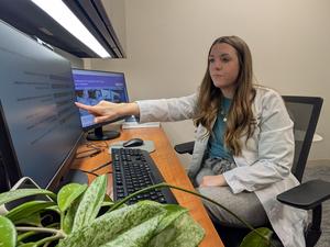 Study senior author Andrea Russell looking at research data in her office at Northwestern Memorial Hospital in Chicago