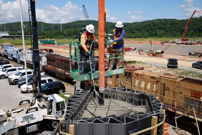 Barnard Construction workers pour concrete