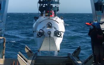 Scientist Pulling Vehicle Alvin up from the Water