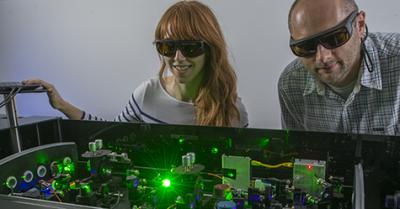 Using Lasers to Track Ultra-Fast Energy Transfers in a Biohybrid Light-Harvesting Antenna
