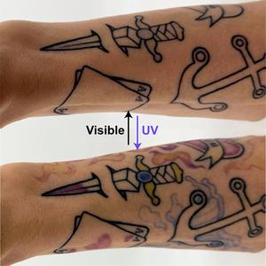 Arm tattoo with and without light