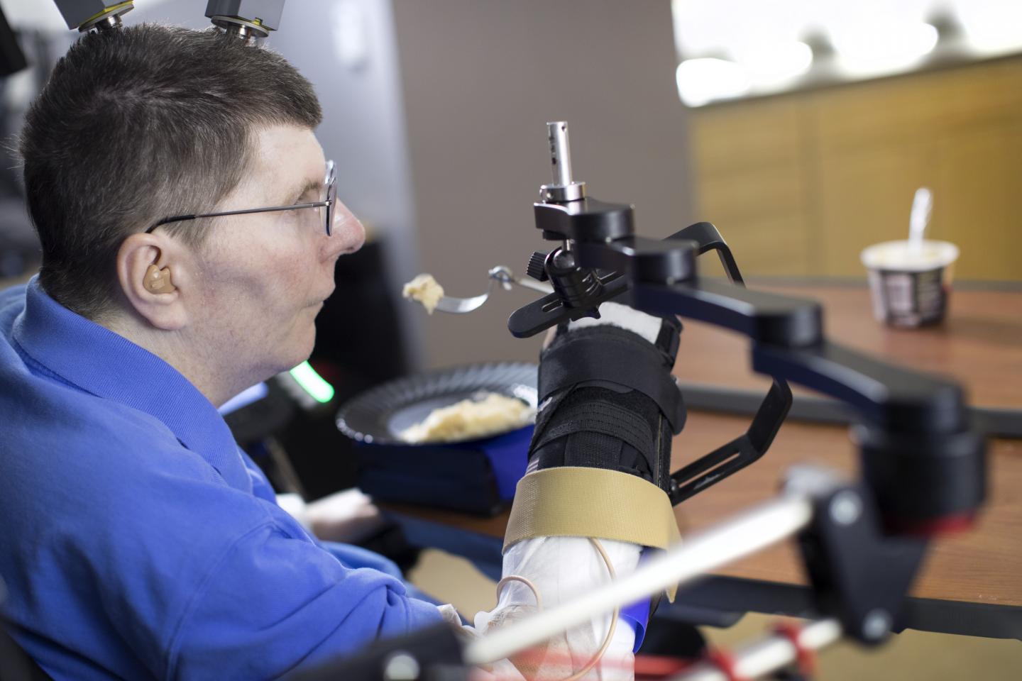Subject Uses the Technology to Feed Himself