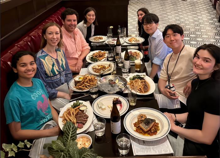 Members of the Wheeler lab are out having dinner in Boston in early 2024.