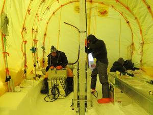 Researchers drilling the ice core in Greenland