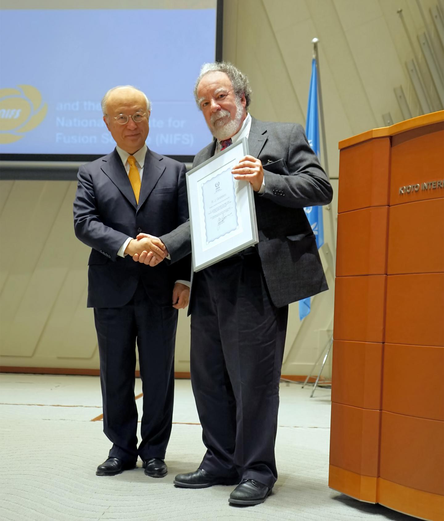 R. Goldston Receives Award Certificate