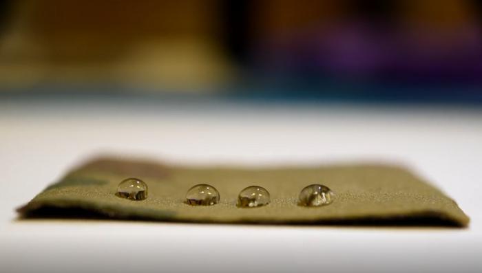 Piece of fabric coated with new non-stick material made via nanoscale fletching technique