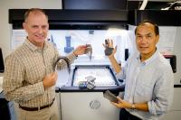 Co-directors of the HP-NTU Corporate Lab, NTU Associate Professor Tan Ming Jen (right) and Dr Mike Reagan (left)