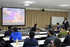 An exhibition match by professional players at the esports symposium