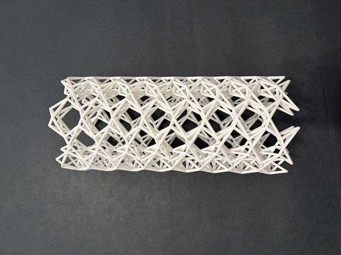 A 3-D printed kagome tube that isolates vibrations
