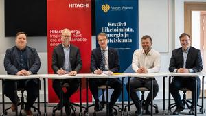 Hitachi Energy and University of Vaasa signing the agreement