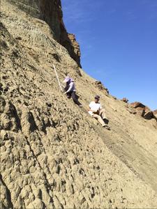 Fieldwork photo of Yanan Fang and Paul Olsen in the Sangonghe Formation at the Haojiagou section in the Junggar Basin
