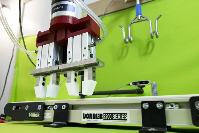 ChicGrasp autonomous robotic arm for poultry processing line