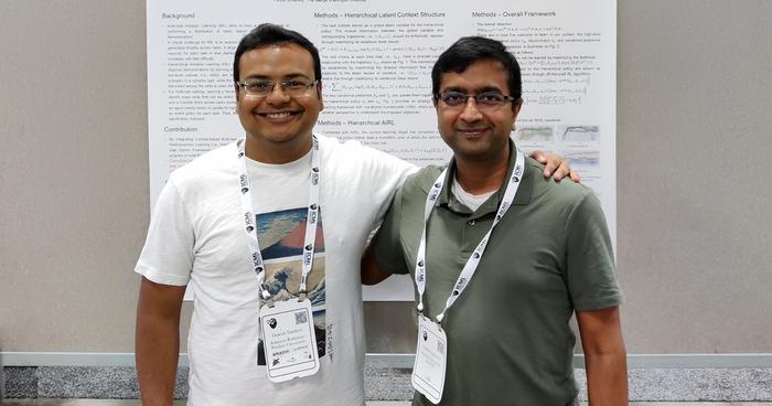 Purdue University researchers Vaneet Aggarwal, right, and Dipesh Tamboli