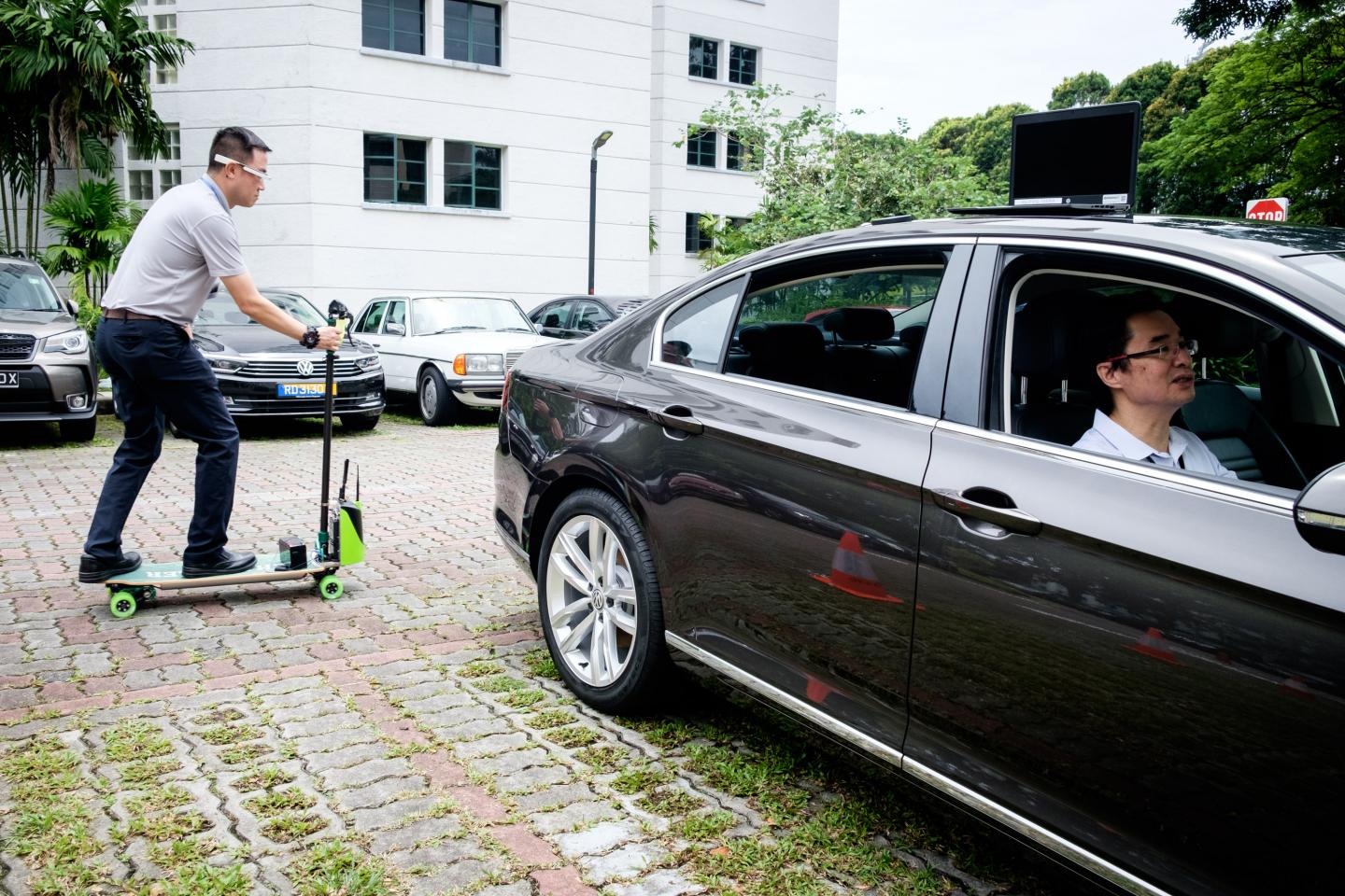 V2X System Which Alerts both Driver and Rider when the PMD Passes behind the Vehicle