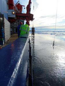 The Gravity corer being deployed to collect samples.