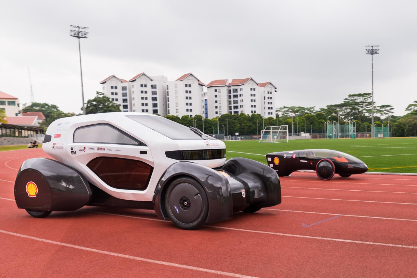 NV 8 and NV 9 Driving Down the Running Track at NTU Singapore