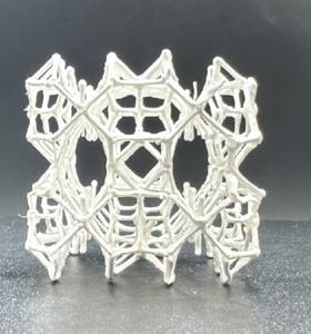 A close-up of the 3D-printed piezoelectric metamaterial, designed by AI and printed by our in-gel printing, to possess properties not found in nature.