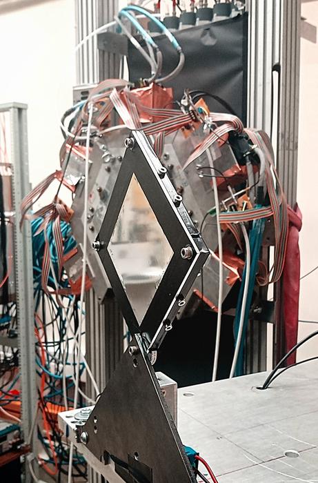 One of two scintillation plates used to measure the kinetic energy of a hadron beam.