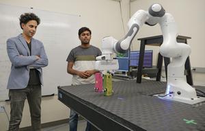 Robot regret photo - Morteza and student