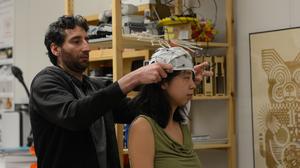 Studying neural synchronization while dancing