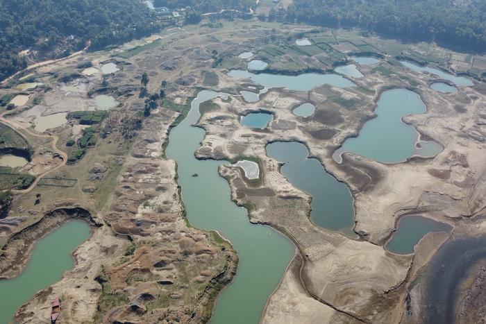 Gravel mining in the Lubha River, Northeast Bangladesh.