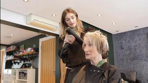 Hair stylist Harriet Barber of B Hairdressing, Bath, with a client