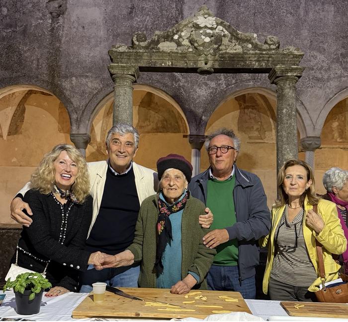 CIAO study scientists gather with an elderly resident of Cilento, Italy.