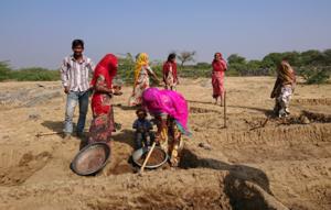Sato on a 2018 visit to a farming village in Rajasthan, India to perform surveys on programs for reducing poverty