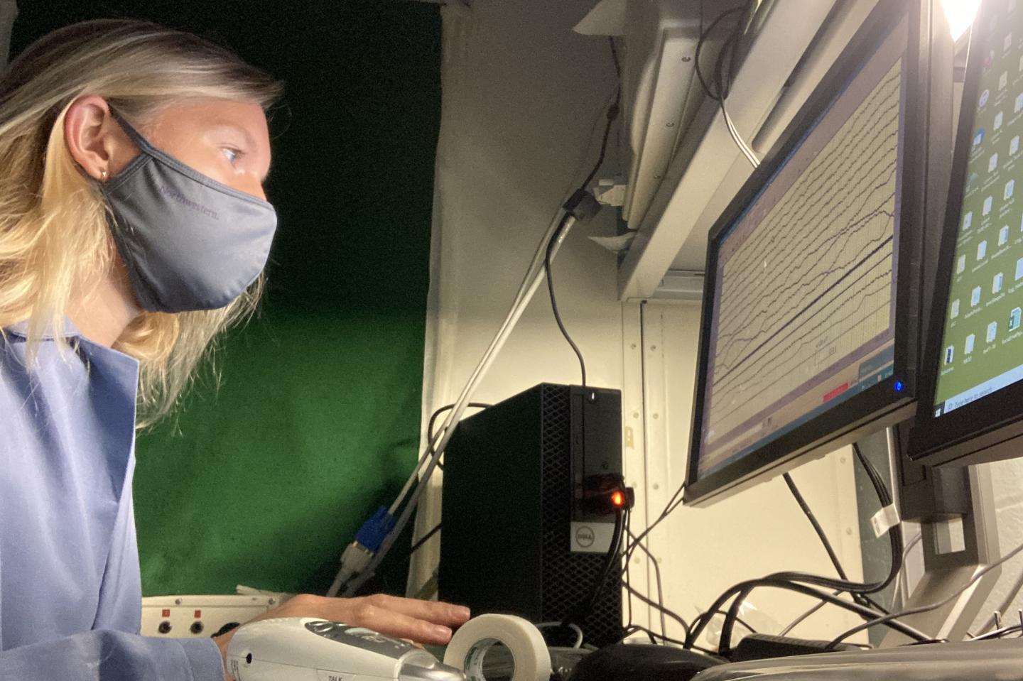Researcher watching brain signals