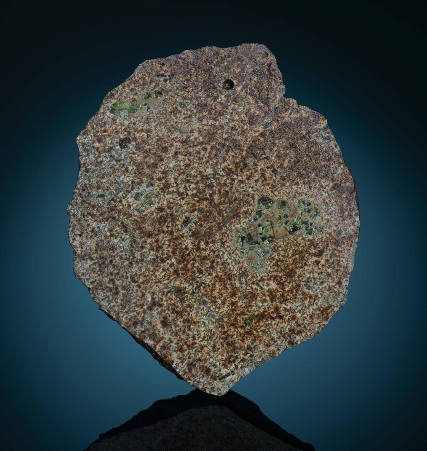 A piece of the EC 002 meteorite. The main mass of the meteorite resides at the Maine Mineral & Gem Museum.