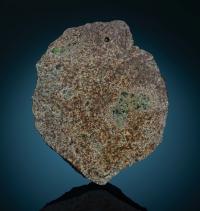A piece of the EC 002 meteorite. The main mass of the meteorite resides at the Maine Mineral & Gem Museum.