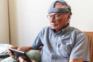 Study volunteer taking the Fastball test in his home