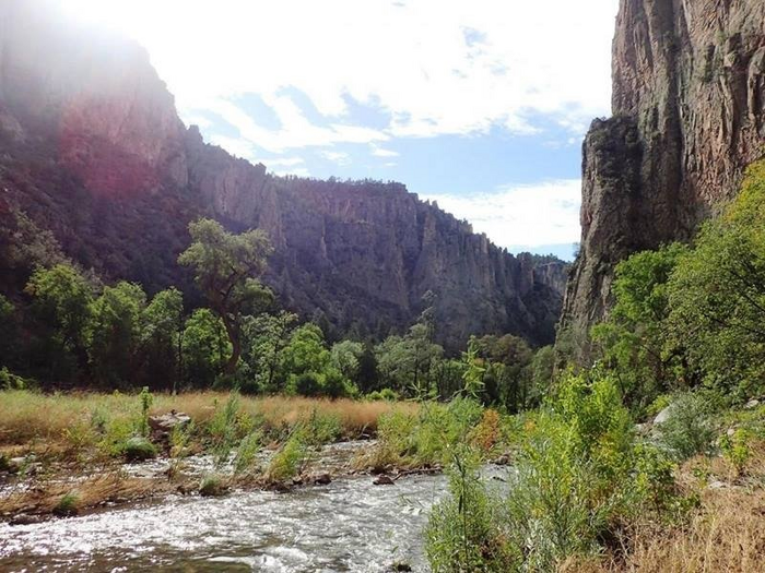 Deep Learning Uses Stream Discharge to Estimate Watershed Subsurface Permeability