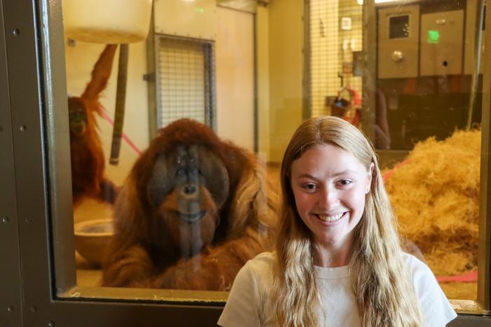 Emma Nelson with orangutan