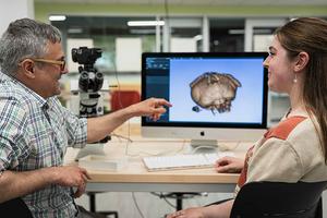 UNH researchers István Mikó and Holly Hoag.