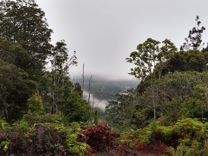 View from a ridge over cloudy slopes of Mt. Pompangeo