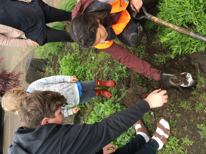 USGS' Erin Worth Deploys Nodal Seismometer with children in Oregon