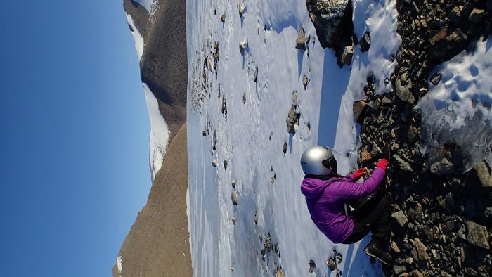 Photo 2: Dr Kate Winter collecting glacial sediments in Dronning Maud Land. Credit: Jacque Richon, IPF