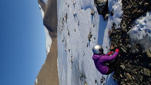 Photo 2: Dr Kate Winter collecting glacial sediments in Dronning Maud Land. Credit: Jacque Richon, IPF