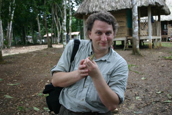 Thomas R. Holtz, Jr. holding a baby crocodile