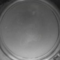 Self-propulsion of an Ethanol Drop on a Cryogenic Bath