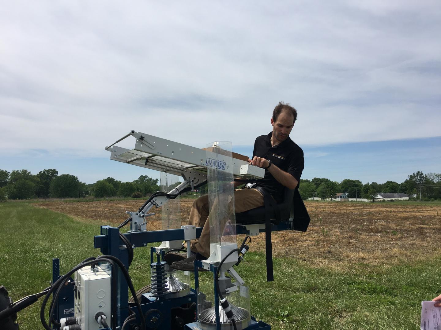 Researcher on a Tractor