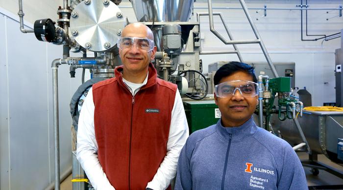 Postdoctoral research associate Tirath Raj (left) and Integrated Bioprocessing Research Laboratory Executive Director Vijay Singh (right) in front of the pretreatment processing facility