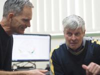 Researchers with Computer Model